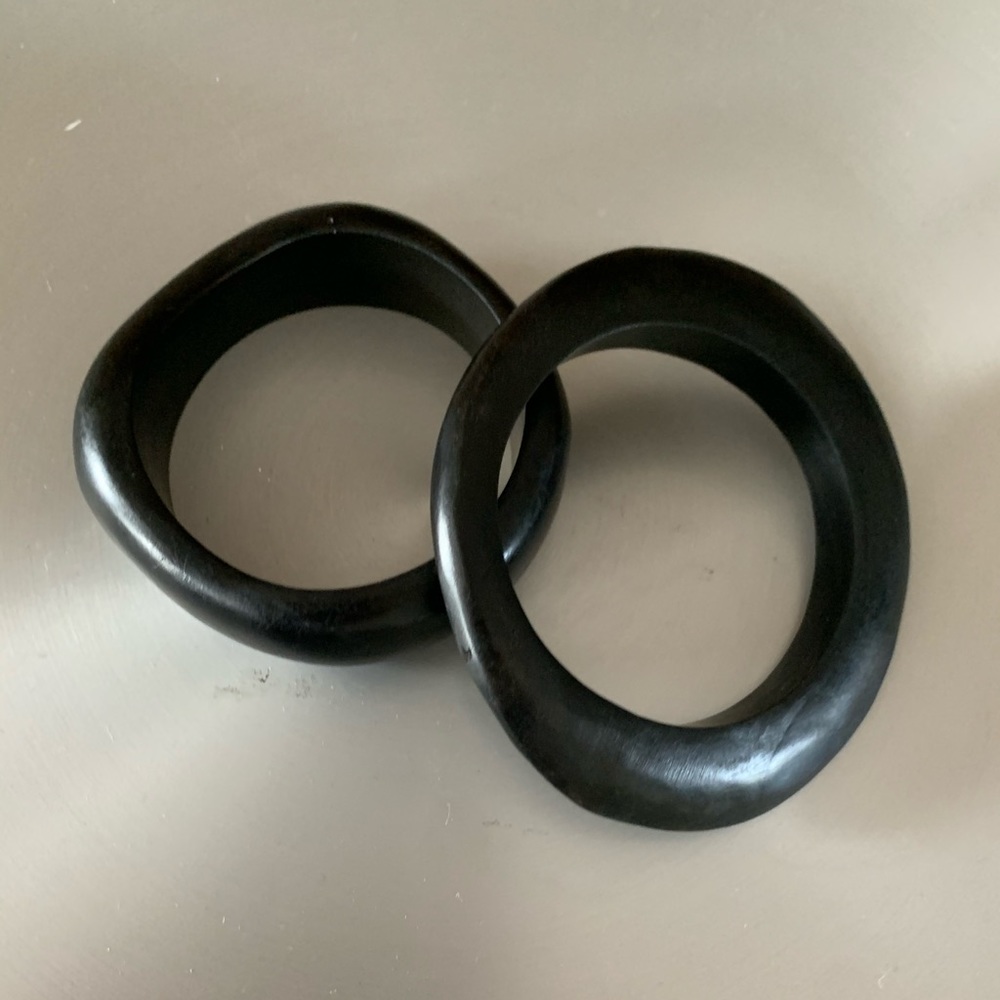 Super chic black wood bracelets.